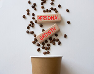 Personal growth symbol. Wooden blocks with words Personal growth. Beautiful white background with coffee cup and coffee beans. Business and Personal growth concept. Copy space.