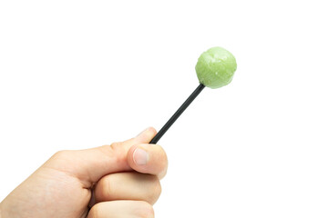 Male hand holding lollipop isolated on white background