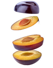 Slices of Plum Falling Isolated on White