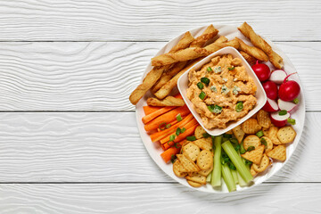 buffalo chicken dip with veggie and bread sticks