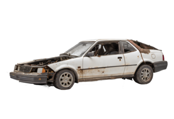An abandoned rusted car isolated on white background with clipping path.