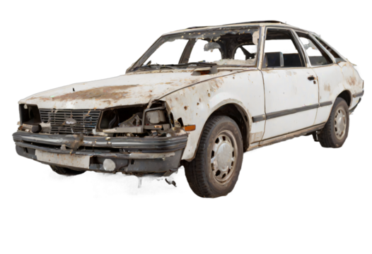 An abandoned rusted car isolated on white background with clipping path.