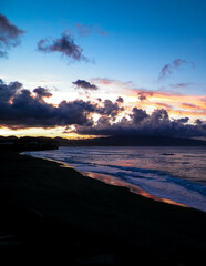 Fototapeta premium Beautiful sunset over beach in Ribiera Grande, Atlantic Ocean, Azores Islands.