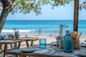 Beachside restaurant with sunset view, Cafeteria wooden table with glass with beach view.