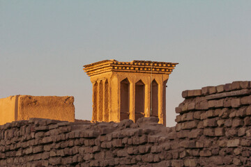 A wind catcher -locally known as Badgir- is constructed with adobes, a genius way to cool down the...