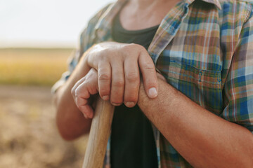 Old Farmer Hands at Work in Rural Agricultural Setting