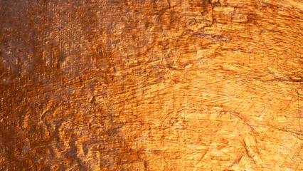 Captivating visual of a rough textured metal surface with visible brushstrokes