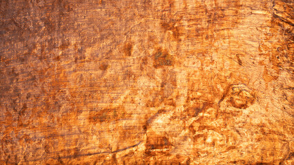 Abstract effect created by scratches and marks on a rusty orange metal texture