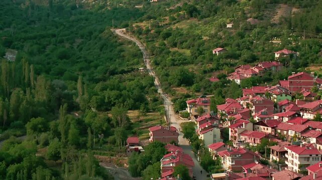 Narrow road leading to the city among greenery, Iskilip, Corum Turkey