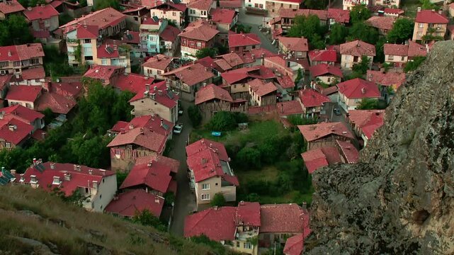 View of the town from the top, town and red brick roofs among the rocks, Iskilip Corum Turkey
