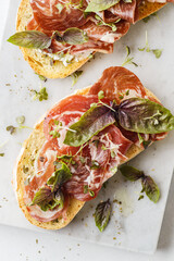 bruschetta with coppa and basil