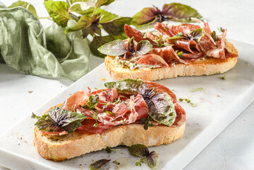 bruschetta with coppa and basil