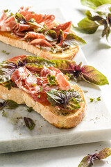 bruschetta with coppa and basil