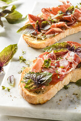 bruschetta with coppa and basil