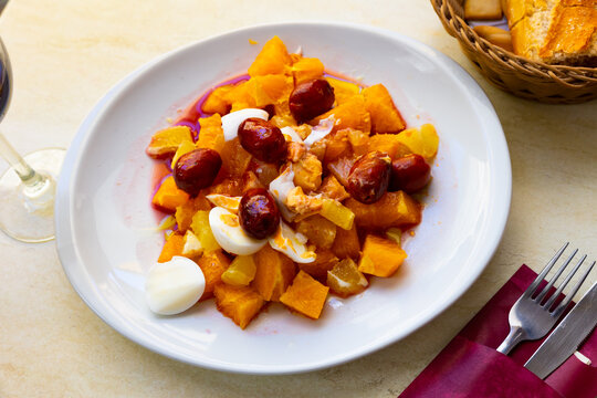 Delicious salad with orange, boiled eggs and kalamata olives, traditional dish of Malaga, Spain