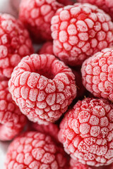 frozen raspberries in a grey bowl