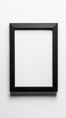 Close-up empty black frame on minimalist white background