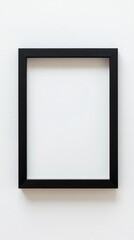 Close-up empty black frame on minimalist white background