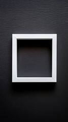 Close-up empty white frame on minimalist black background