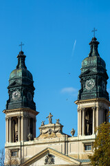 The main attraction of the city PAPA, Hungary, Veszprem district against the sky in sunny weather. Church of the Holy Martyr Stephen. Religion, prayer. Cathedral of the 18th century. Nagytemplom