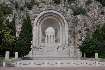 Fototapeta premium Nice, France - May 23, 2024: the historic and made of stones monument aux morts de Rauba-Capeu, a memorial to the Great War.