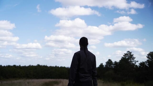 silhouette of a person taking a picture in slow motion