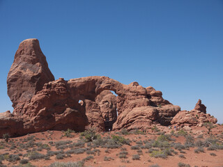 Fototapeta premium Famous Turret Arch and surrounding red rock desert landscape, Arches National Park, Utah