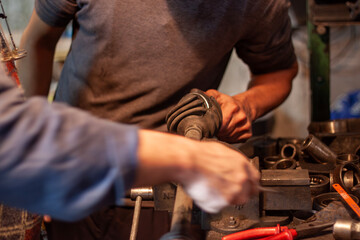 Vintage Mechanical Workshop with Visible Tools and Parts in Disarray