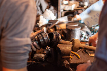 Vintage Mechanical Workshop with Visible Tools and Parts in Disarray