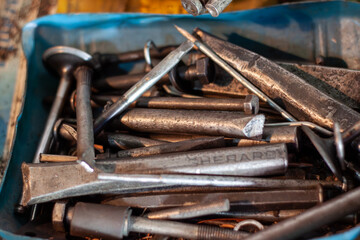 Vintage Mechanical Workshop with Visible Tools and Parts in Disarray
