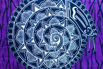 top view of purple and white ankara fabric, flatlay of nigerian wax cloth, rumpled purple and white ankara material