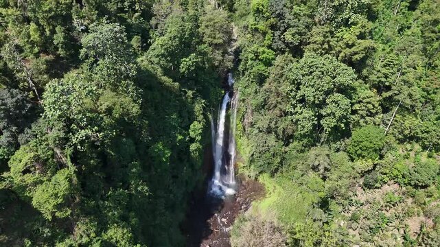 Aerial view of Git Git waterfall captured by drone in Bali, Indonesia