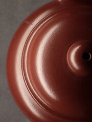 Closeup of a purple clay teapot, traditional Chinese tea culture