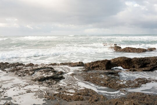 waves crashing on the rocky shore