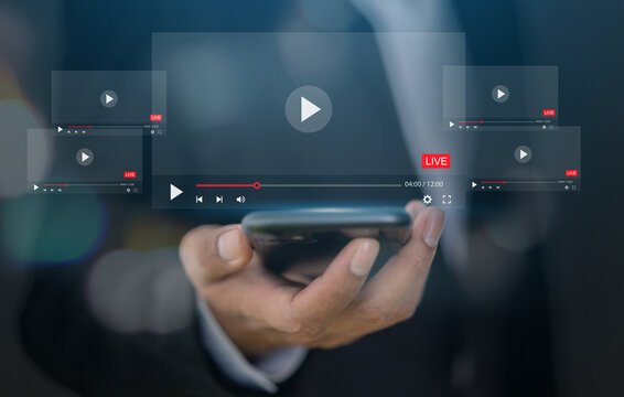 Modern concept live streaming and video content creation, business hold technology smartphone with multiple video play and live stream, digital media and online communication, social media marketing