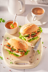Delicious and healthy sandwich made of chicken, cheese and cucumber.