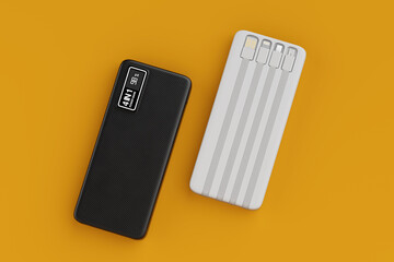 White and Black Mobile Devices Charging Power Banks. 3d Rendering