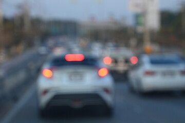 highway traffic with safety barrier on road asphalt, blurred image