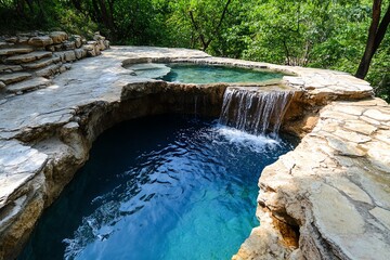 Naklejka premium A hot spring with a waterfall cascading into it, adding a soothing sound to the tranquil environment