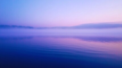 Obraz premium Serene Morning Mist: Tranquil Fog Over Still Lake at Dawn