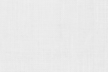 Fototapeta premium Jute hessian sackcloth woven texture pattern background in light white color textile. White canvas fabric, linen cotton cloth rough texture background of watercolour paper craft blank cardboard empty.