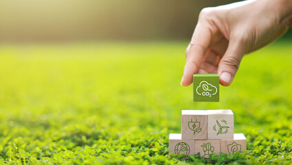 Wooden block for co2, ESG and net zero. Carbon reduction strategy and action to limit climate...