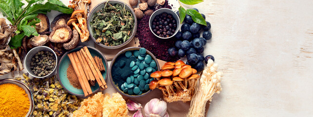 Adaptogen healthy food. Herb and spice collection on light background