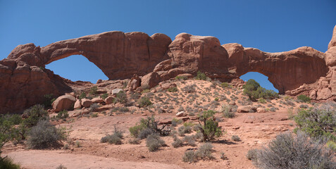 Giant Windows Arch and surrounding red rock Utah desert landscape panoramic view, Arches National...