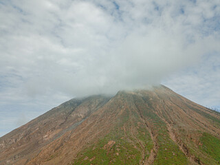 Aerial drone view of Mount Sinabung at Berastagi in North Sumatra, Indonesia.