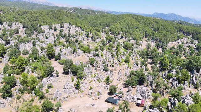 The area of conglomerates of rocks surrounding the ancient city of Selge in Antalya. The area called Avatar Land, named Rocks of Man, because it resembles a standing person, creates a fantastic image.