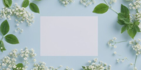 Minimalistic Flat Lay White Frame with Green Leaves and Flowers