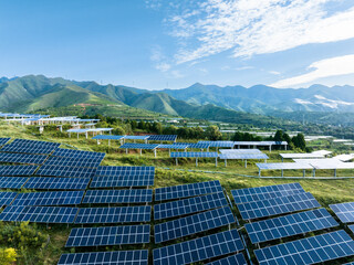 view of solar power station on green hill