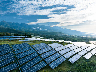 view of solar power station on green hill