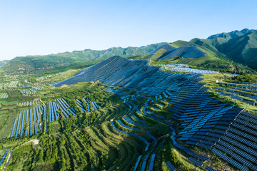 view of solar power station on green hill